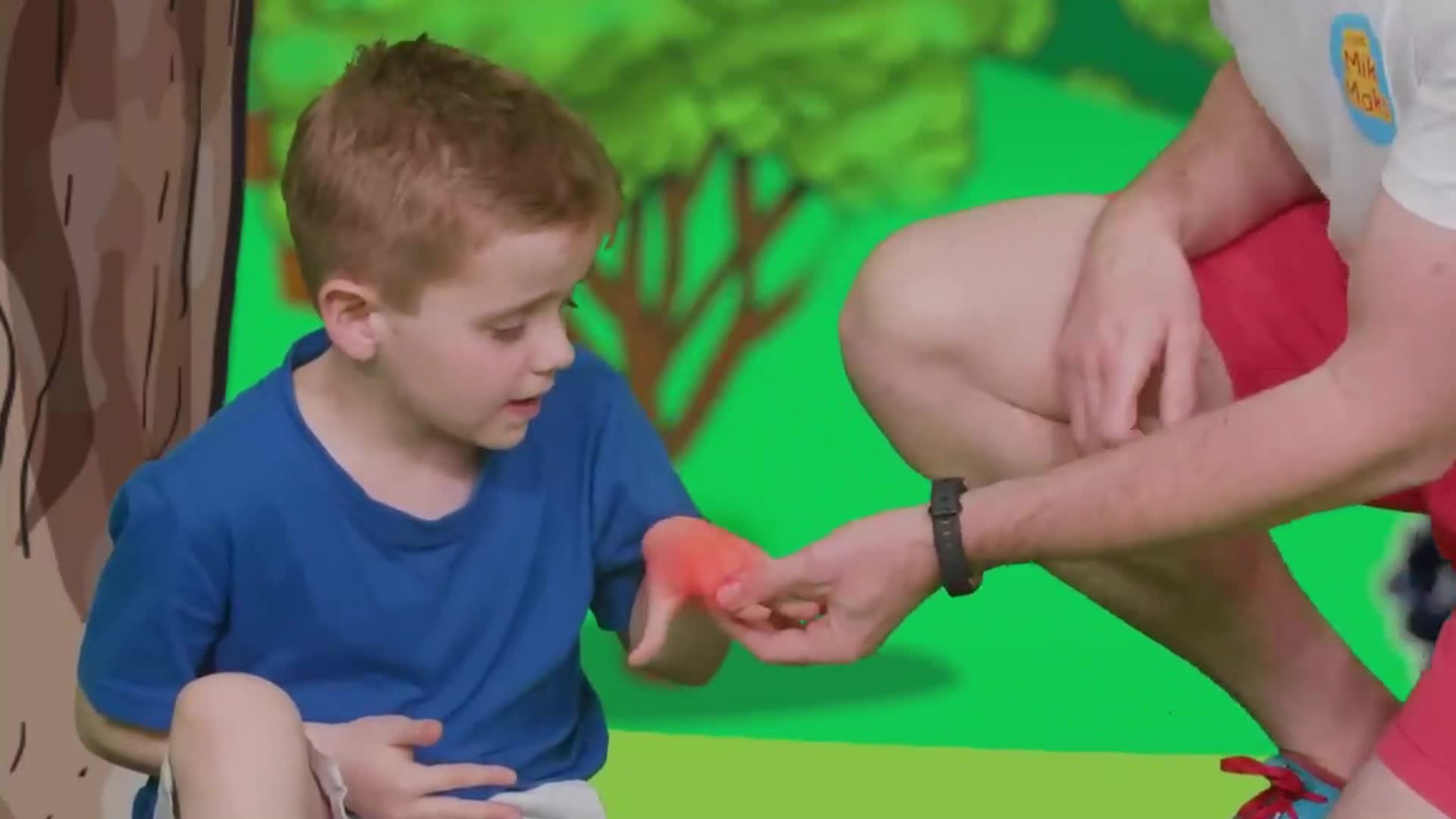 A father and son create a colorful painting together, laughing and learning along the way. A video about creating happy, colorful memories.