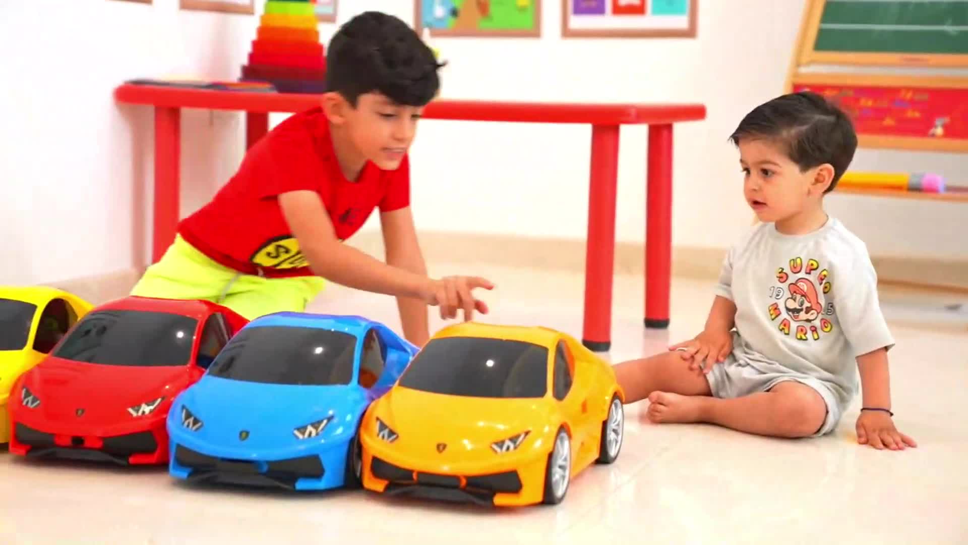 Sharing a colorful ball toy means sharing all the colors of the rainbow! This video explores color identification through the fun playtime of two brothers.