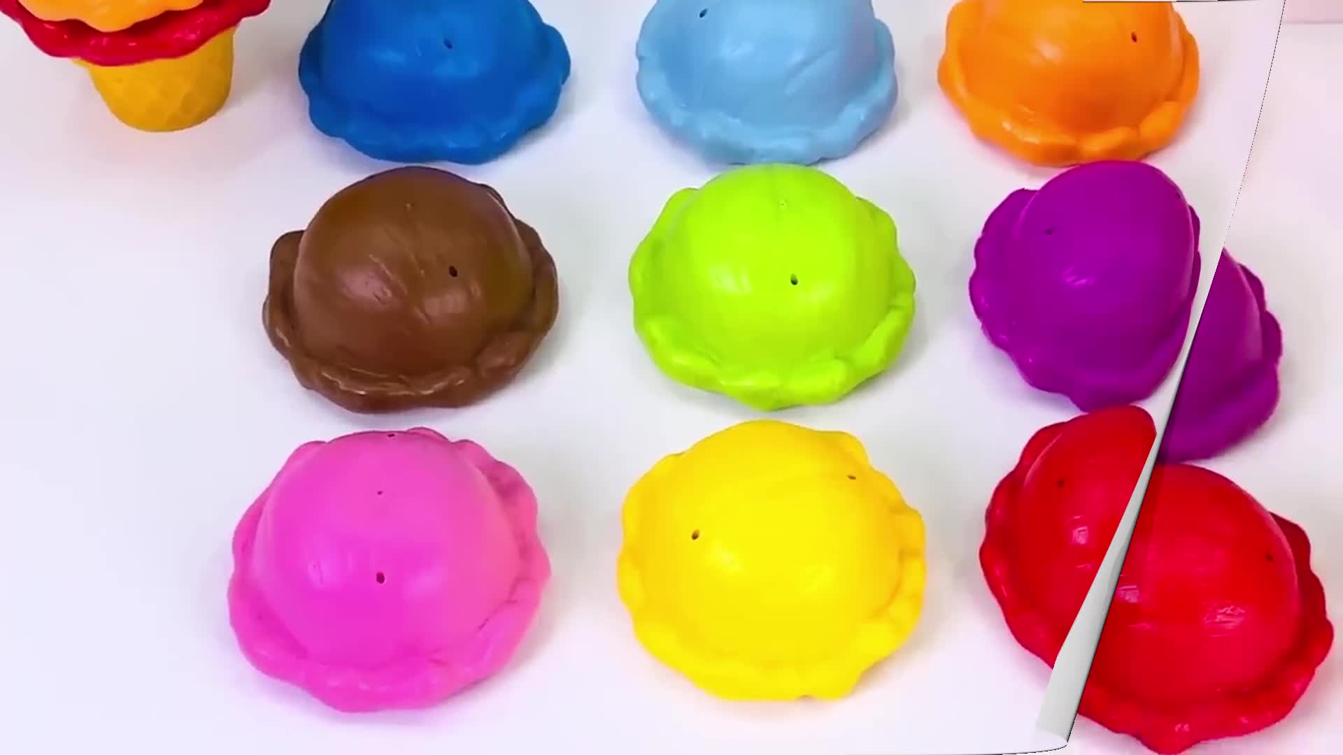 Learn your colors one scoop at a time! This video focuses on identifying the colors of different ice cream flavors, from pink strawberry to green mint.